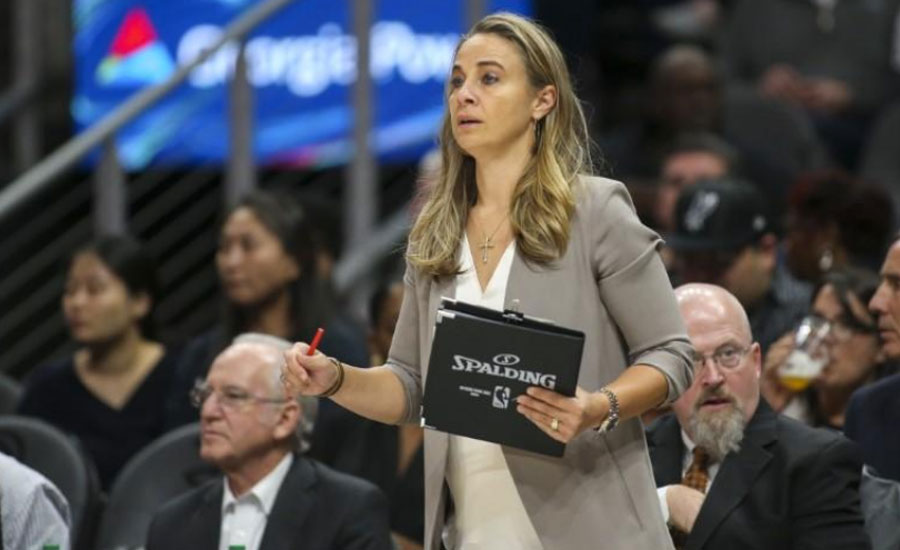 Spurs' Hammon makes NBA history as first woman to lead team