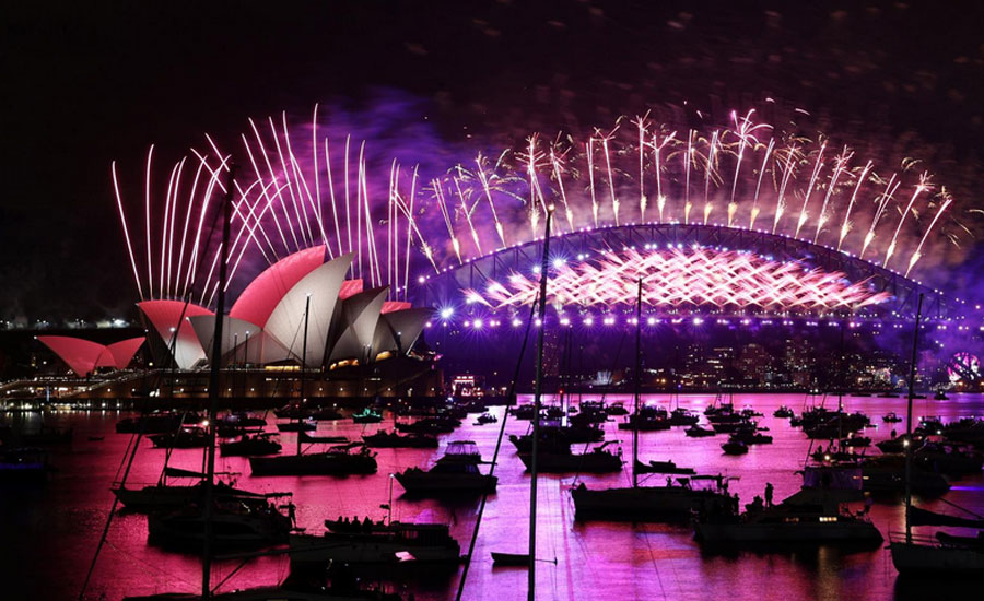 'I will survive': 2020 slinks into history as fireworks light deserted streets