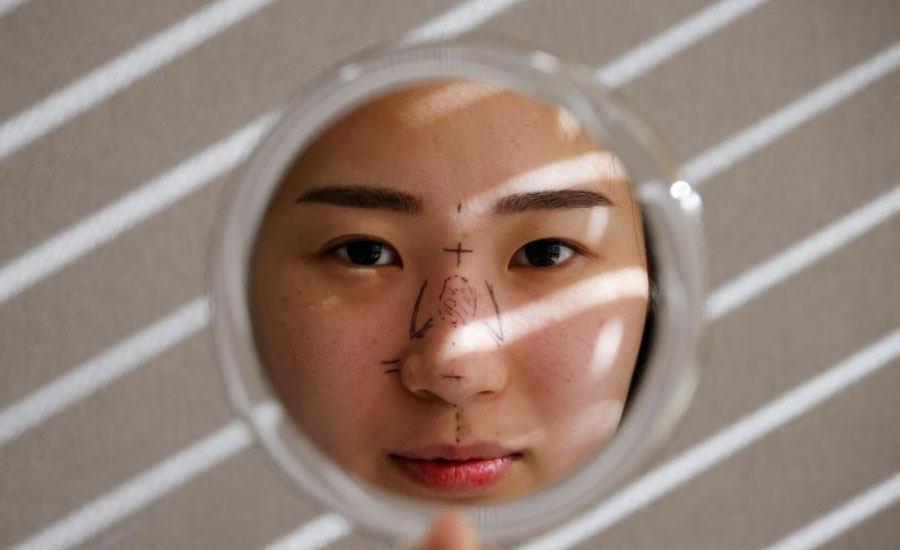 As end to pandemic mask-wearing nears, South Koreans scramble to arrange cosmetic surgery