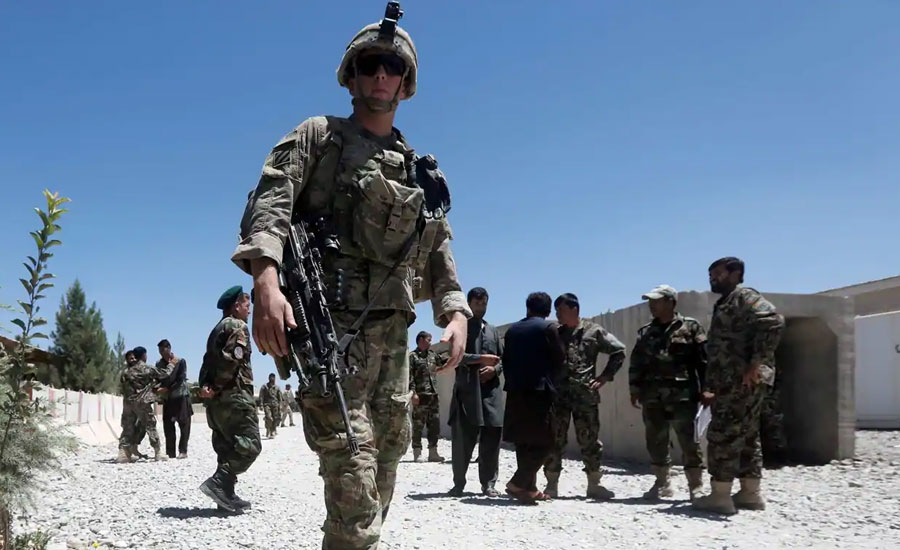International troops to stay in Afghanistan beyond May deadline, say NATO officers