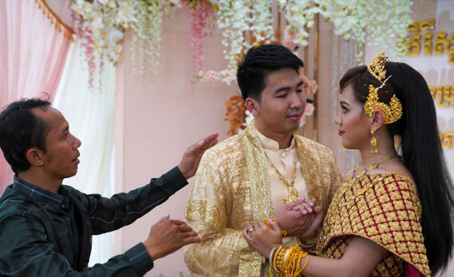Cambodian couple finally tie the knot with glittering ceremony after pandemic curbs ease