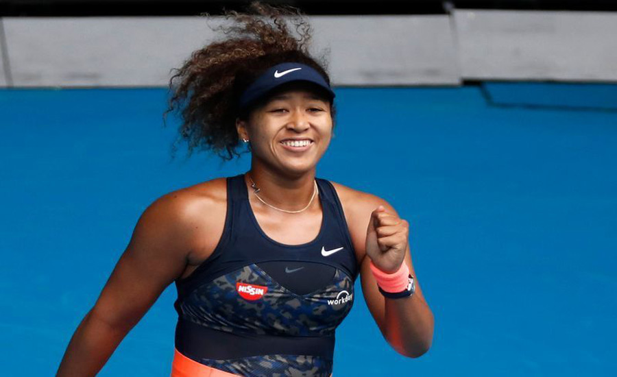 Osaka back from the brink to reach quarter-finals