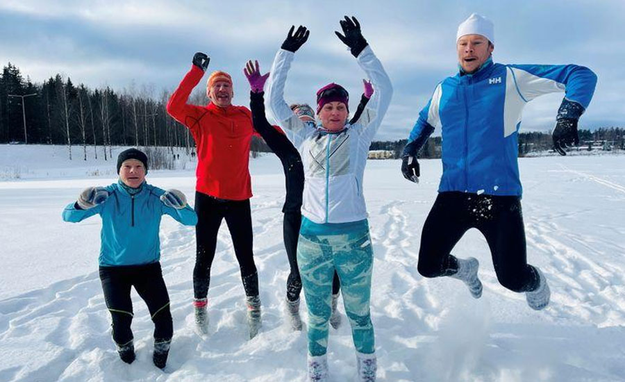 Weary of COVID restrictions, Finns take up running in deep snow in socks