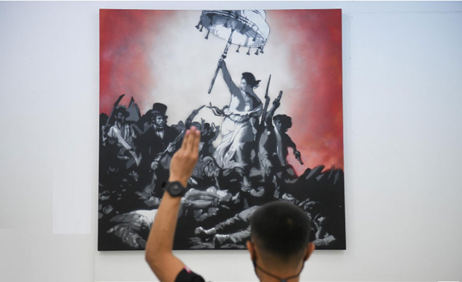 Thai artist tackles taboos with 'lese majeste' exhibition
