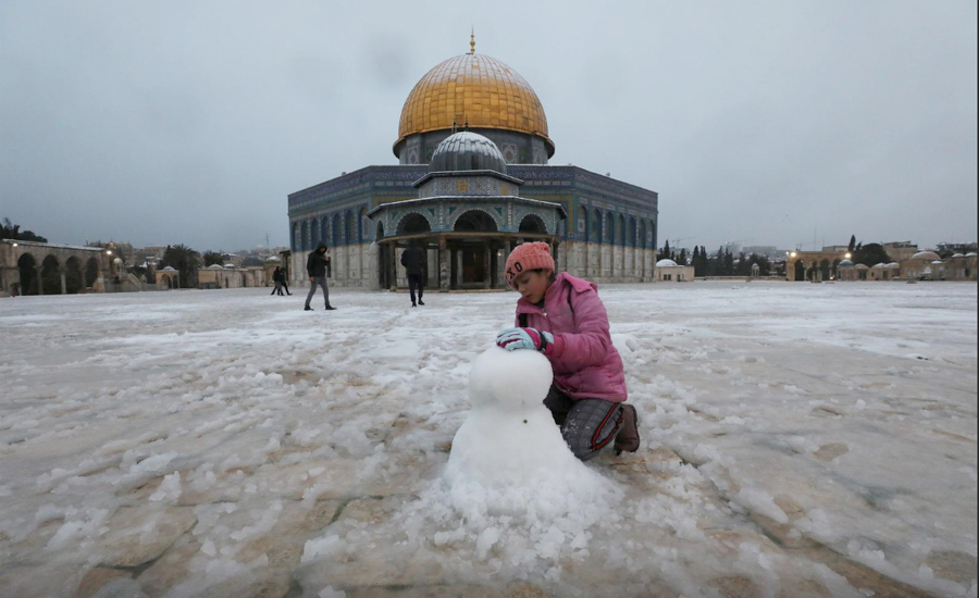 Jerusalem's Old City turns white after rare snowfall