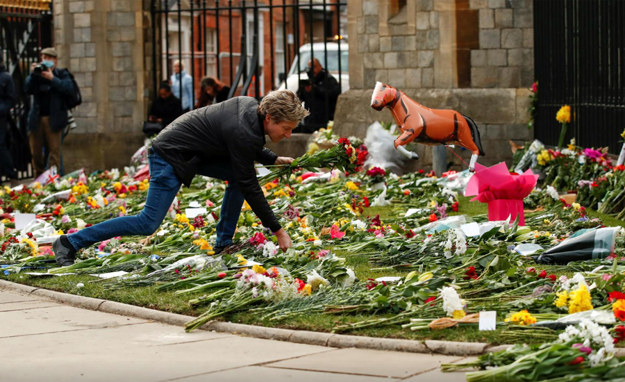 Britain mourns Prince Philip but 'no flowers please' due to COVID