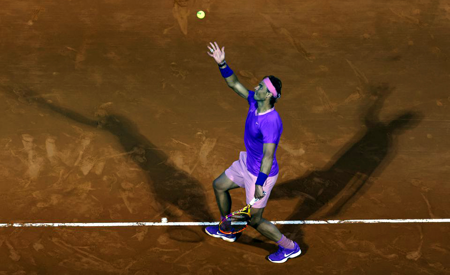 Rafael Nadal rallies from set down to advance in Barcelona