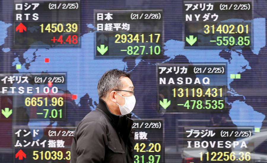 Asian shares mixed as earnings fail to inspire before Fed