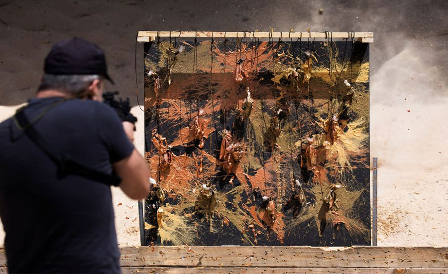 Art attack: Israeli ex-sniper blasts paint in mental health message