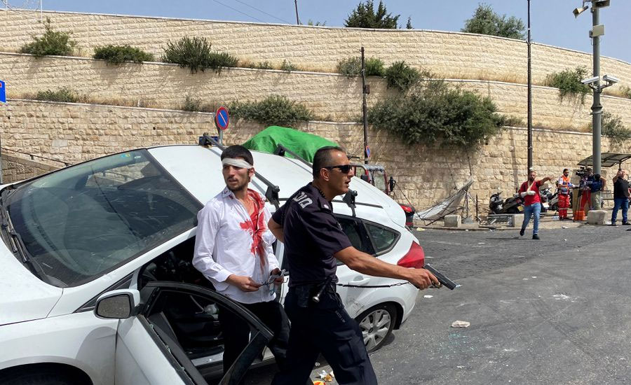 Palestinians stone Israeli car, which crashes, as Jerusalem seethes