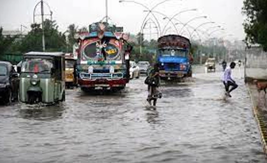 Roads inundated under rainwater resulting massive traffic jams in Karachi
