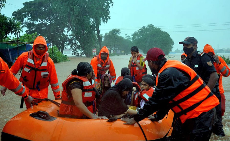 Heavy rain in India triggers floods and landslides, at least 138 dead