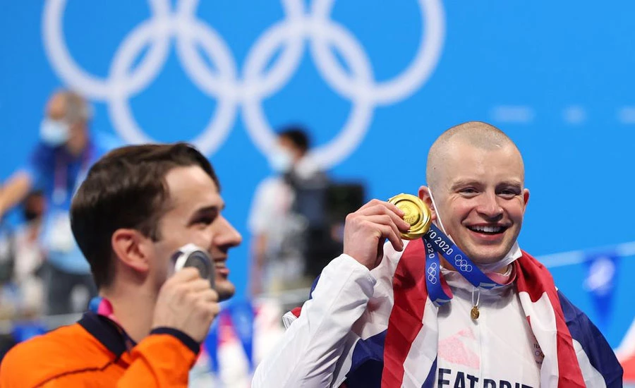 Swimming-Peaty roars in relief with Britain's first gold