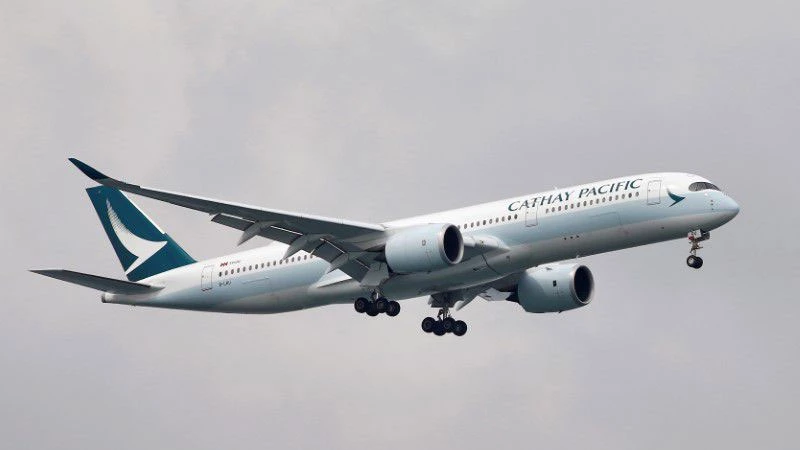 Cathay Pacific posts narrower H1 loss as costs fall