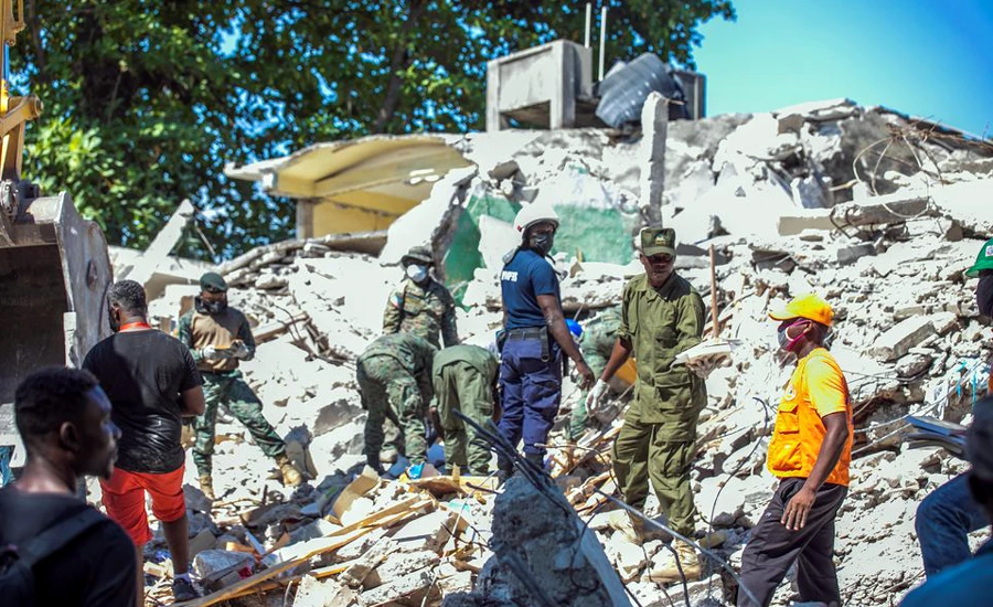 Haiti hospitals overwhelmed by quake victims as death toll hits 1,297