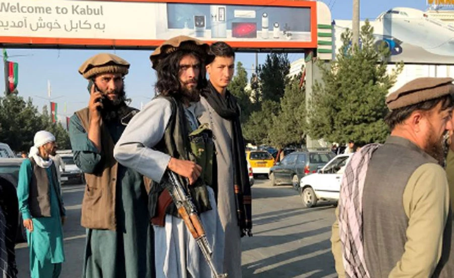 Taliban fire in the air to control crowd at Kabul airport