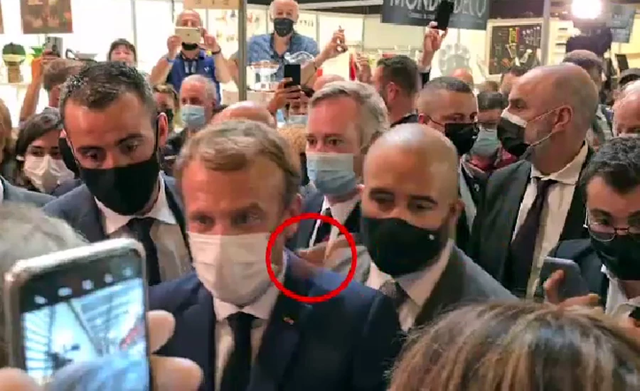 French President Macron egged by protester shouting ' long live the revolution'