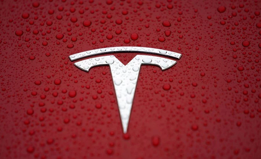 EV firm Tesla joins trillion-dollar club after 10 percent surge