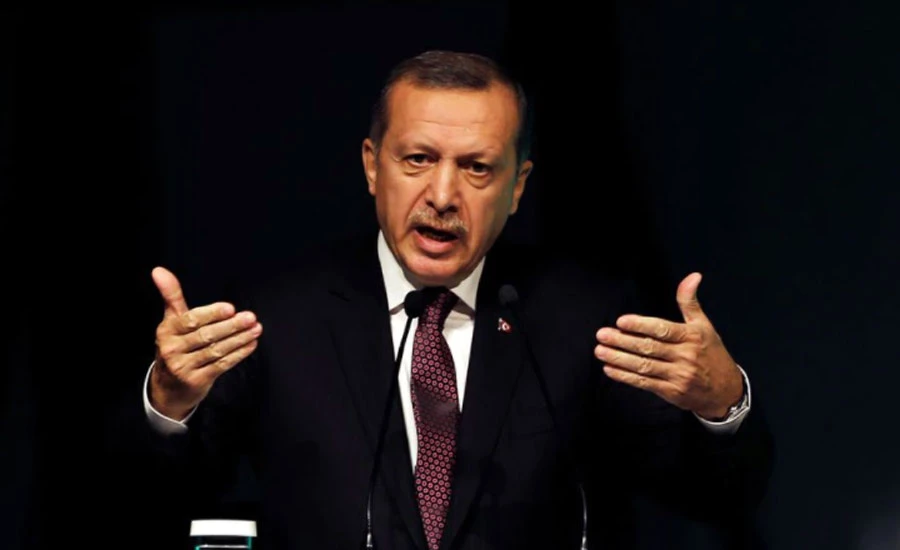 Erdogan says he will keep battling interest rates, hitting lira