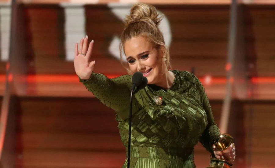 British singer Adele tops UK music charts record-breaking comeback album "30"