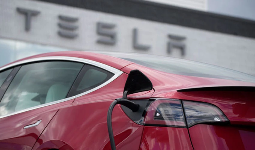 Tesla delivers almost 1 mn cars globally