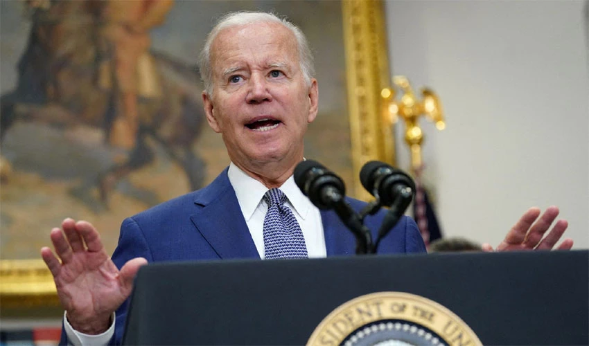 Biden stops short of declaring climate emergency, takes steps on wind power