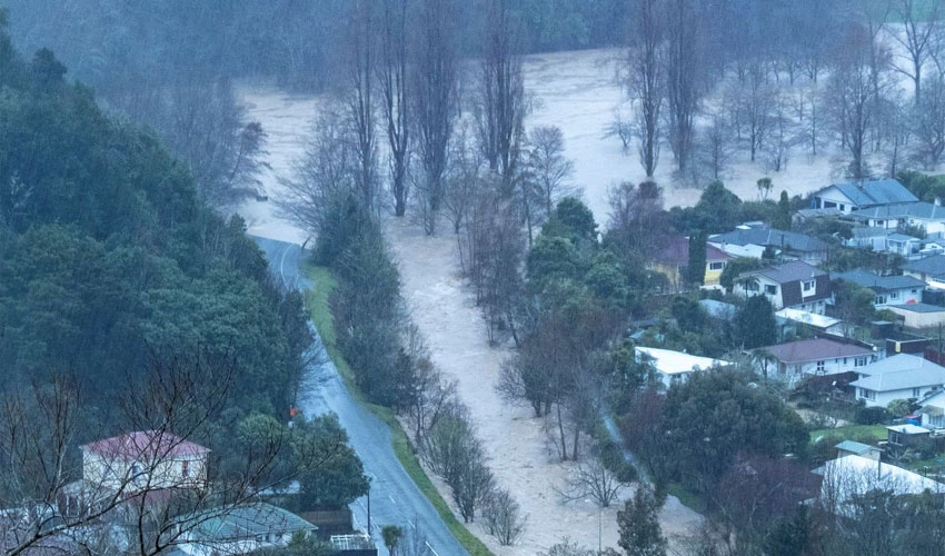 Rains pounding New Zealand ease but more forced from homes