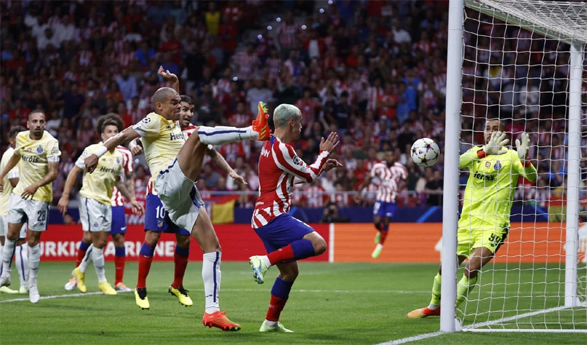 Soccer: Last-gasp Griezmann goal gives Atletico win over 10-man Porto