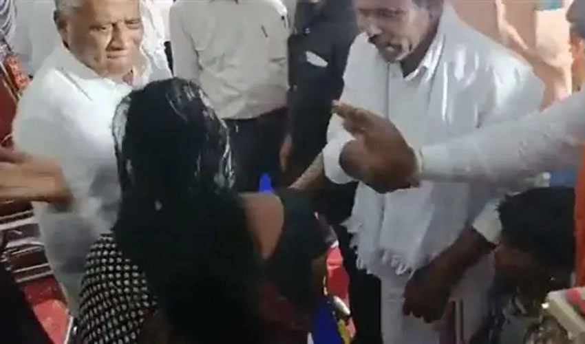 Angry Karnataka minister slaps woman at public event