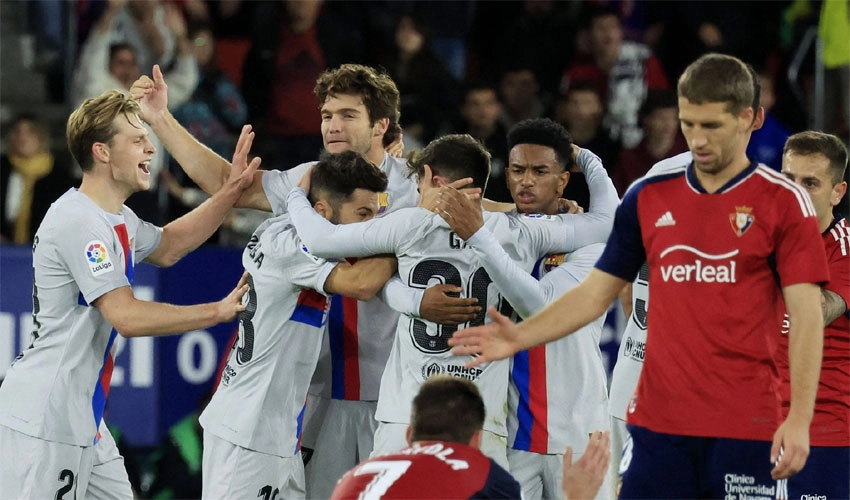 Soccer: Ten-man Barcelona fight back to win 2-1 at Osasuna after Lewandowski sees red