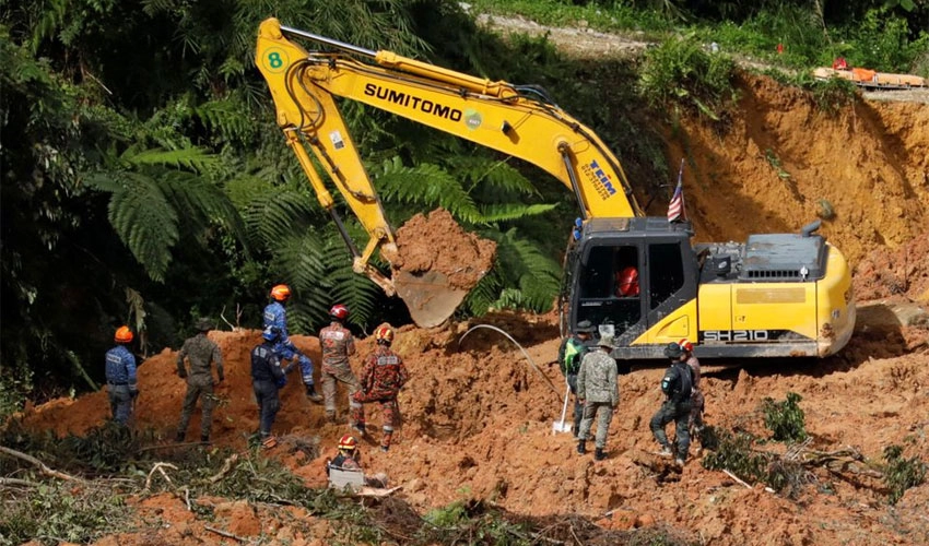 Malaysia campsite search continues as 12 still missing after deadly landslide