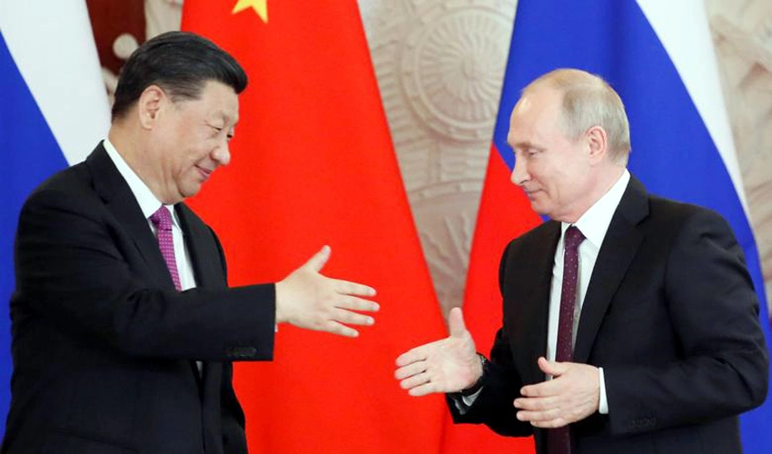 Xi, Putin hail ties ahead of 'journey of peace' to Moscow