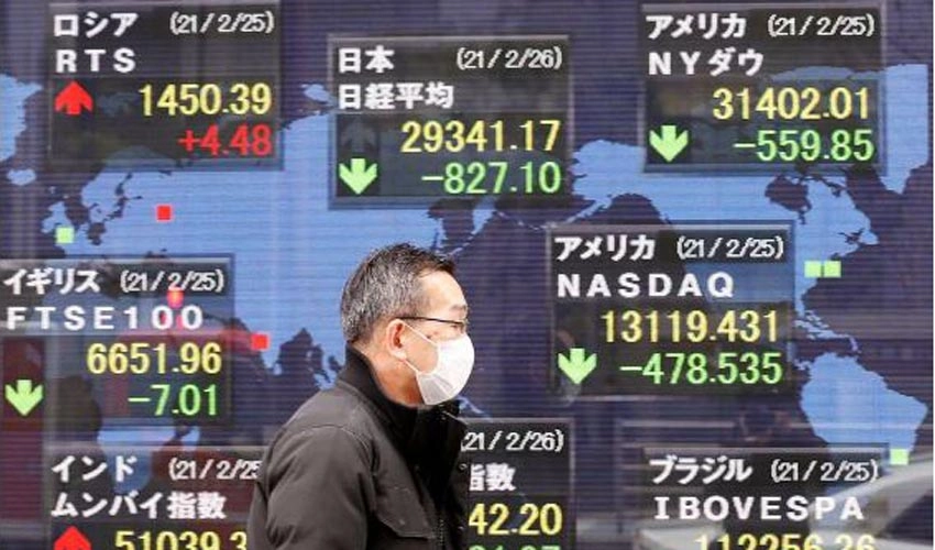 Most Asian markets up as traders weigh outlook on rates, economy