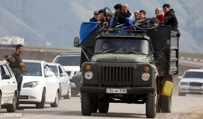 Azerbaijan seeks 'war crime' suspects in sea of Karabakh refugees