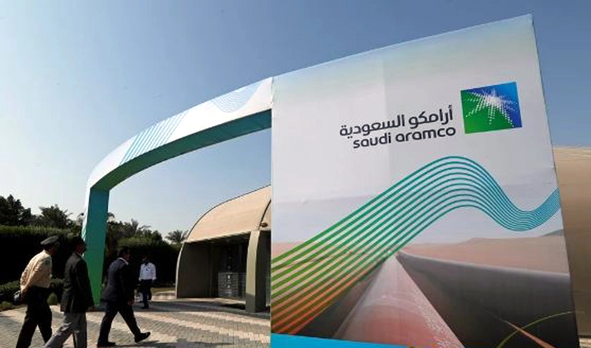 Saudi Aramco profits down 23 percent on lower oil prices, cuts