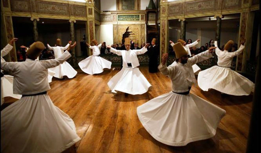 'Tombstone' hats remind whirling dervishes of their death