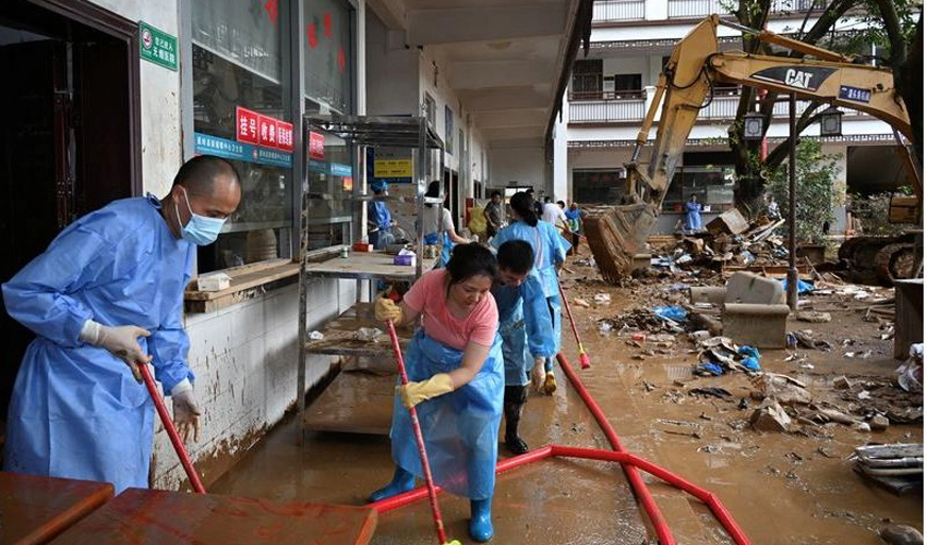 Death toll in south China flooding jumps to 38: state media