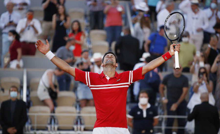 Djokovic fights back to win second French Open title