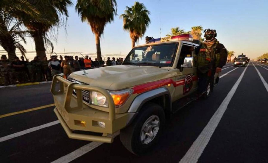 Iraq paramilitaries show off weaponry in big, anniversary parade